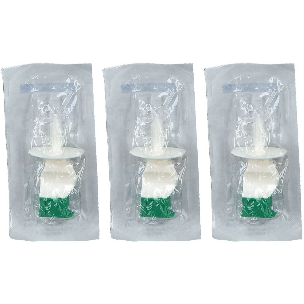 Drei medizinische Applikatoren in Folienverpackung. Jeder Applikator hat einen weißen, zylindrischen Kopf und einen grünen Sockel.