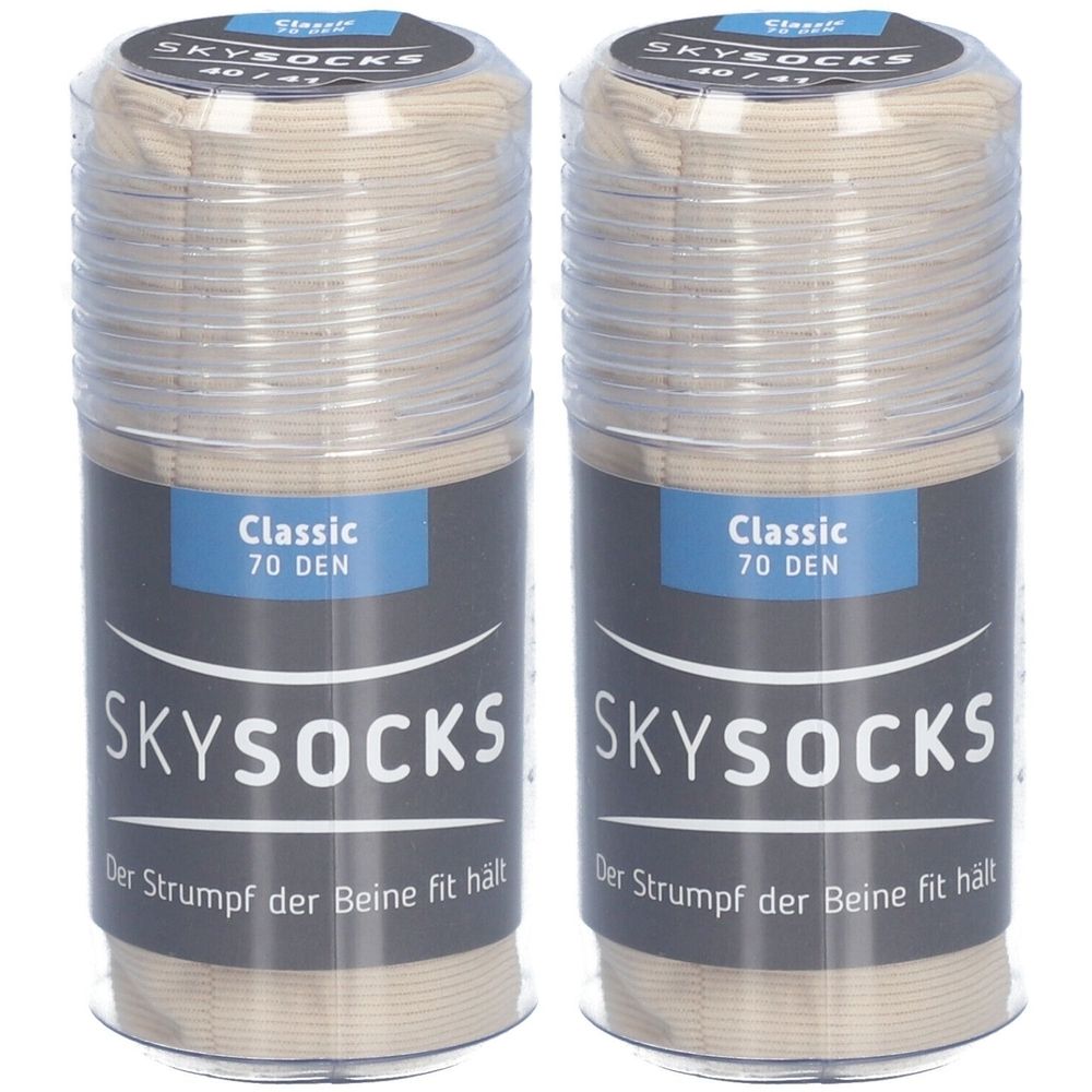 Zwei Packungen Strümpfe. Aufschrift: SKYSOCKS, Classic 70 DEN. Sandfarbene Strümpfe in zylindrischen Verpackungen mit transparentem Deckel.
