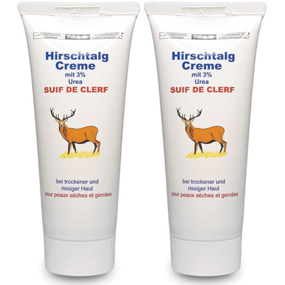 Zwei Tuben Creme. Aufschrift: Hirschtalg Creme mit 3% Urea, SUIF DE CLERF. Abbildung eines Hirsches. Text: bei trockener und rissiger Haut.