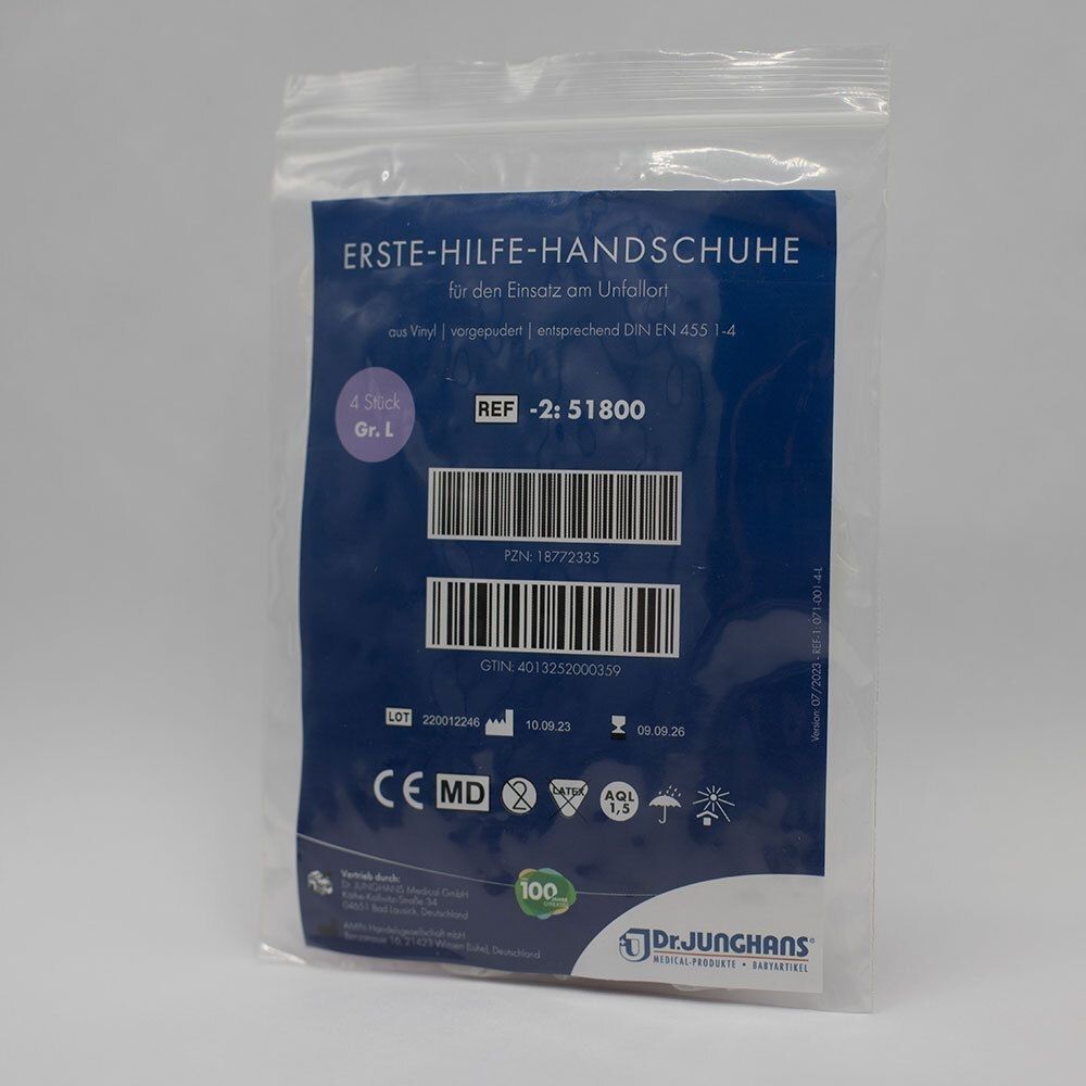 Verpackung mit Erste-Hilfe-Handschuhen. Blaue Rückseite mit Text und Barcodes. Größe L, 4 Stück. CE-Kennzeichnung und Logo von Dr. Junghans.