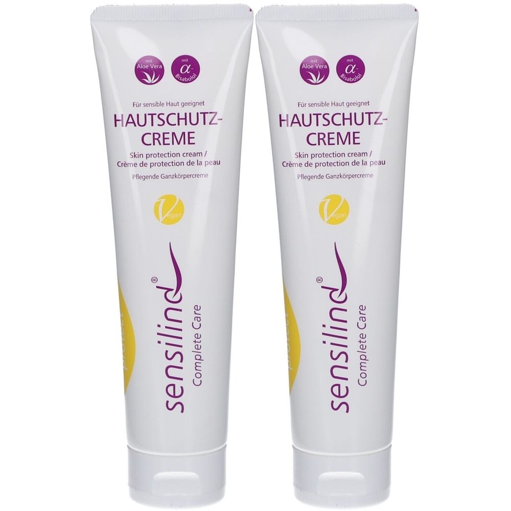 Zwei Tuben Hautschutzcreme. Weiß, mit lila und gelben Akzenten. Beschriftung: HAUTSCHUTZ-CREME, Sensilind.