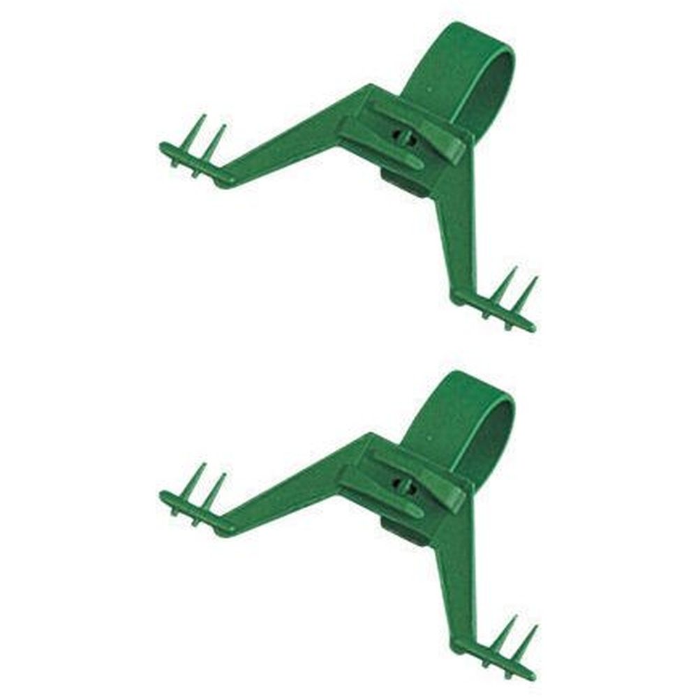 Zwei grüne Beutelaufhängungen. Jede hat einen Ring, einen Halter und drei Zacken.