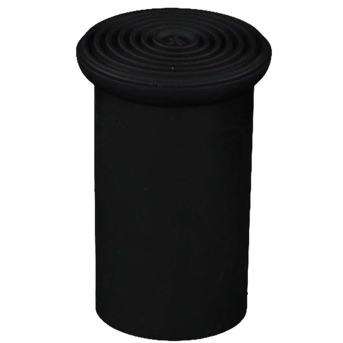 Schwarze, zylindrische Krückenkapsel mit geriffelter Oberseite. Die Kapsel hat einen Durchmesser von etwa 20 mm.