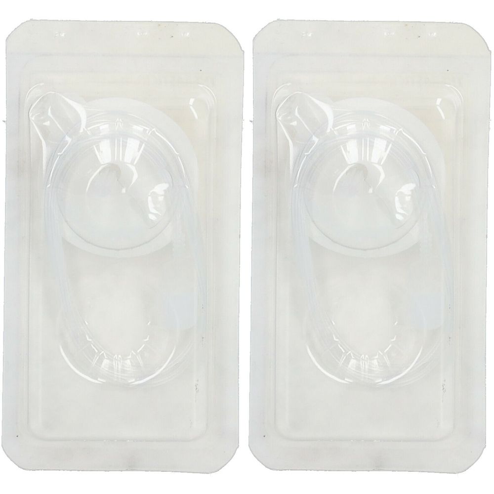 Zwei medizinische Kanülen in transparenten Blistern. Jede Kanüle hat einen runden Teil und einen Schlauch.