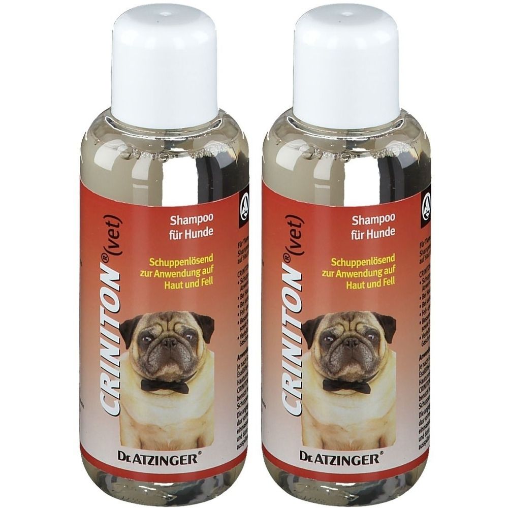Zwei Flaschen CRINITON (vet) Shampoo für Hunde. Rote Etiketten mit Produktinformationen und einem Mops-Bild. Weiße Kappen.