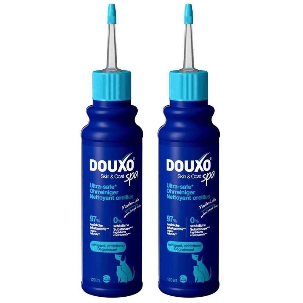 Zwei blaue Flaschen mit Dosierspitze. Aufschrift DOUXO Skin & Coat spa, Ohrreiniger. Enthält 97% natürliche Inhaltsstoffe.