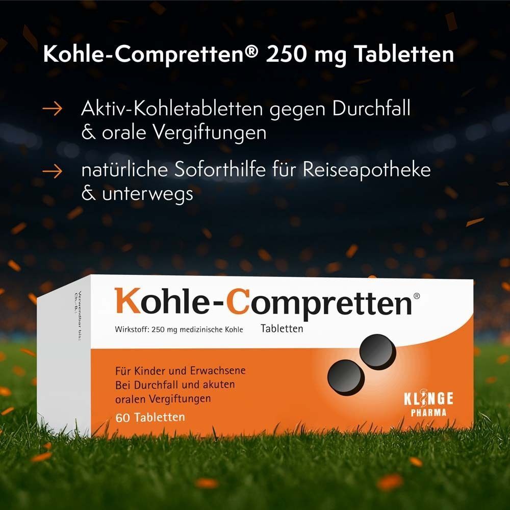 Kohle-Compretten®-Packung auf Rasen. Text: Aktiv-Kohletabletten gegen Durchfall & orale Vergiftungen. Natürliche Soforthilfe für Reiseapotheke.