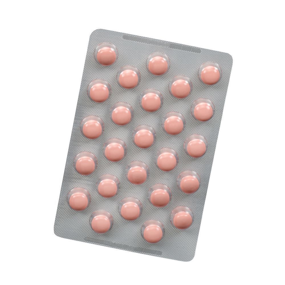 Blister mit rosa Tabletten. Grauer Hintergrund. Tabletten in Blistern.