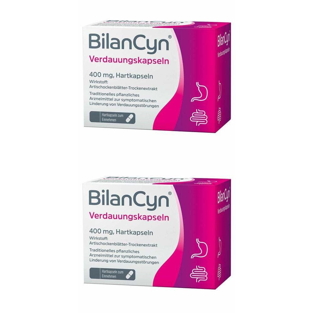 Zwei Packungen BilanCyn Verdauungskapseln. Rosa-weiße Schachteln mit Produktnamen, Inhaltsangaben und einem Verdauungssymbol.