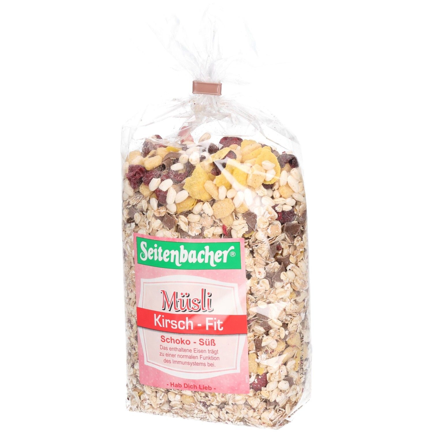 Transparente Tüte mit Müsli. Aufdruck: Seitenbacher, Müsli Kirsch-Fit, Schoko-Süß. Cerealien, Kirschen und Schokostücke sind sichtbar.