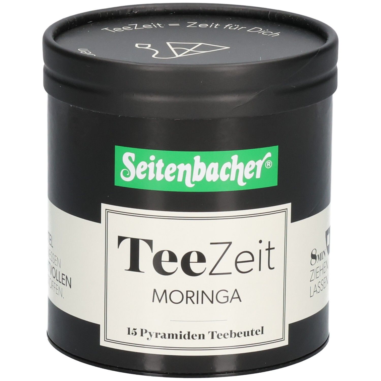 Schwarze Dose mit grünem Seitenbacher-Logo und weißem Etikett. Aufschrift: TeeZeit MORINGA, 15 Pyramiden Teebeutel.