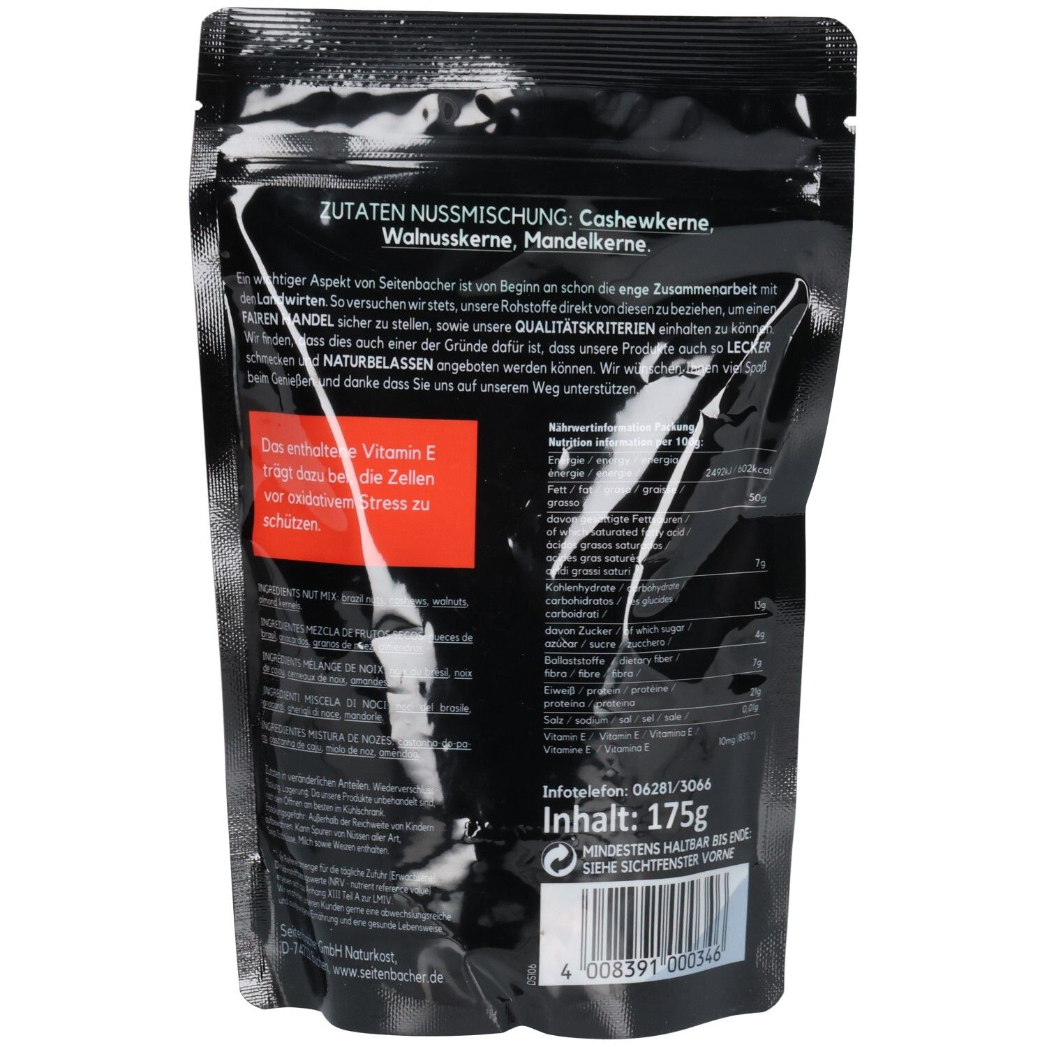 Rückseite der Tüte. Schwarzer Hintergrund mit Text. Roter Streifen. Enthält Informationen zu Zutaten und Nährwerten.