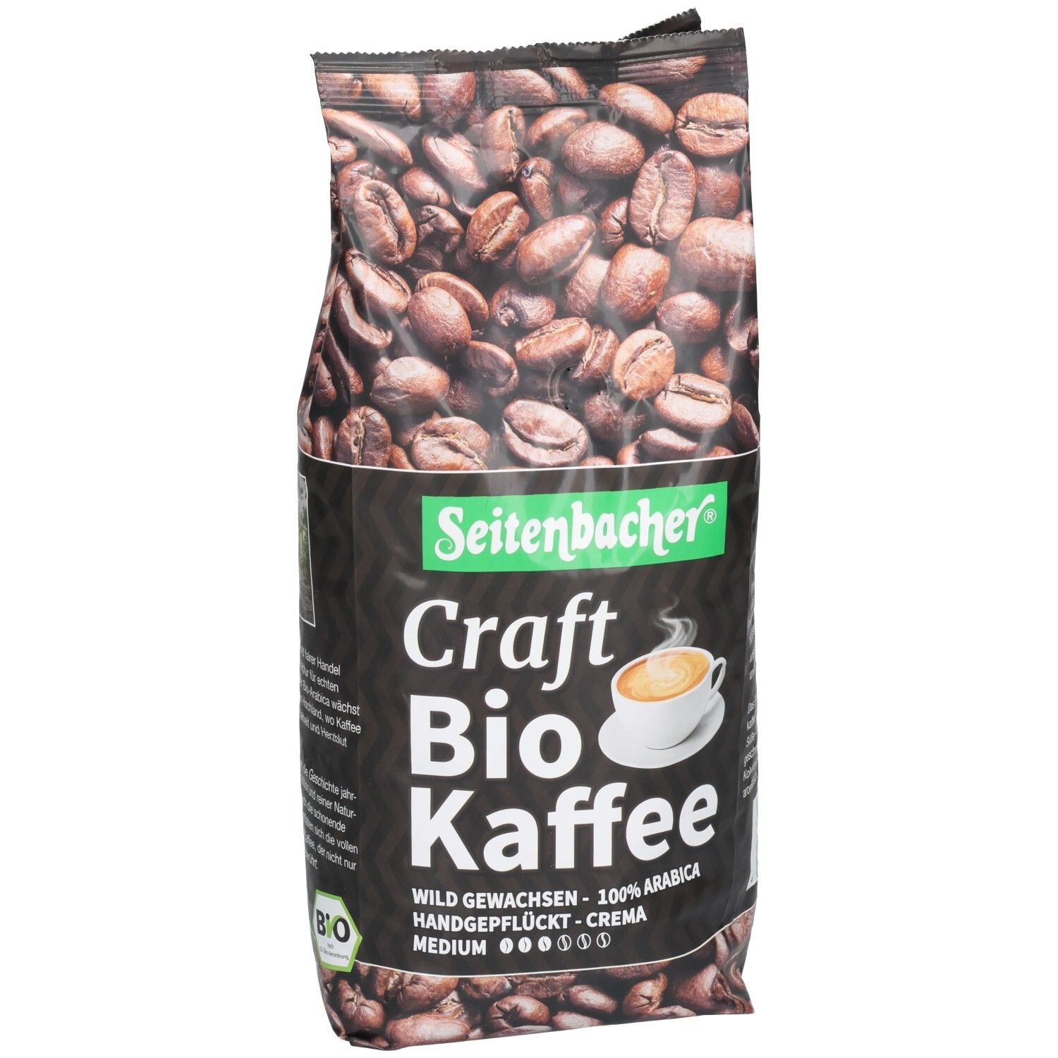 Kaffeebohnen in einer Verpackung. Aufschrift: Seitenbacher Craft Bio Kaffee. 100% Arabica. Bio-Siegel.