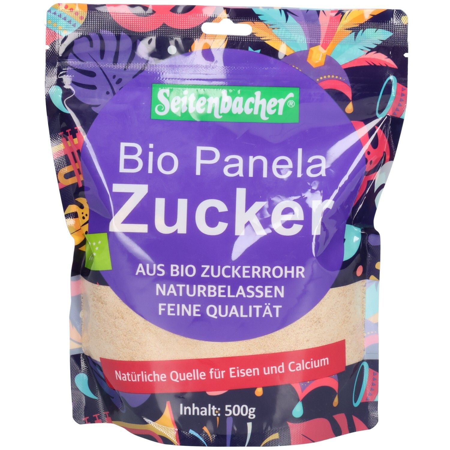Beutel mit Seitenbacher Bio Panela Zucker. Runde, violette Fläche mit Produktbezeichnung. Bio-Siegel. Inhalt: 500g.