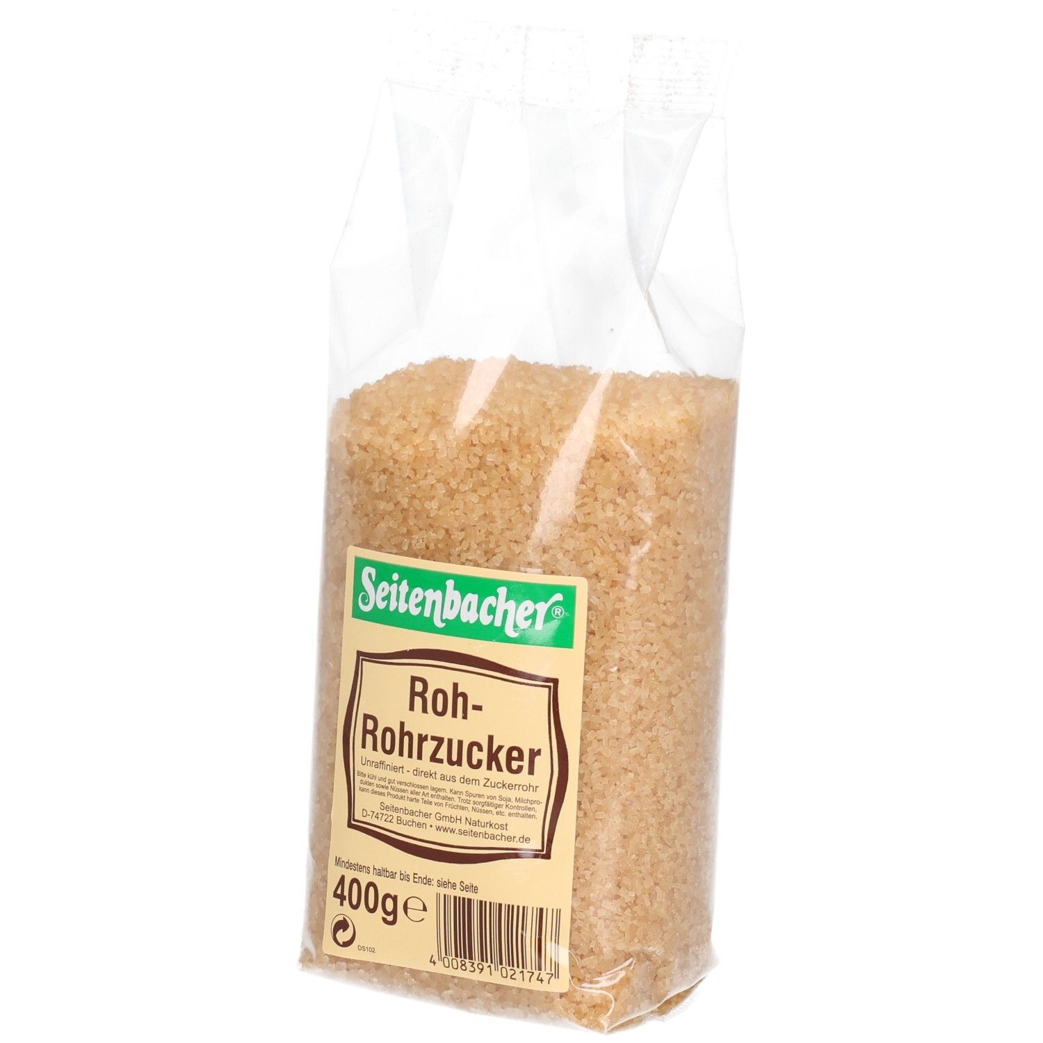 Brauner Rohrzucker in transparenter Verpackung. Seitenbacher-Etikett mit Produktbezeichnung und Gewicht.