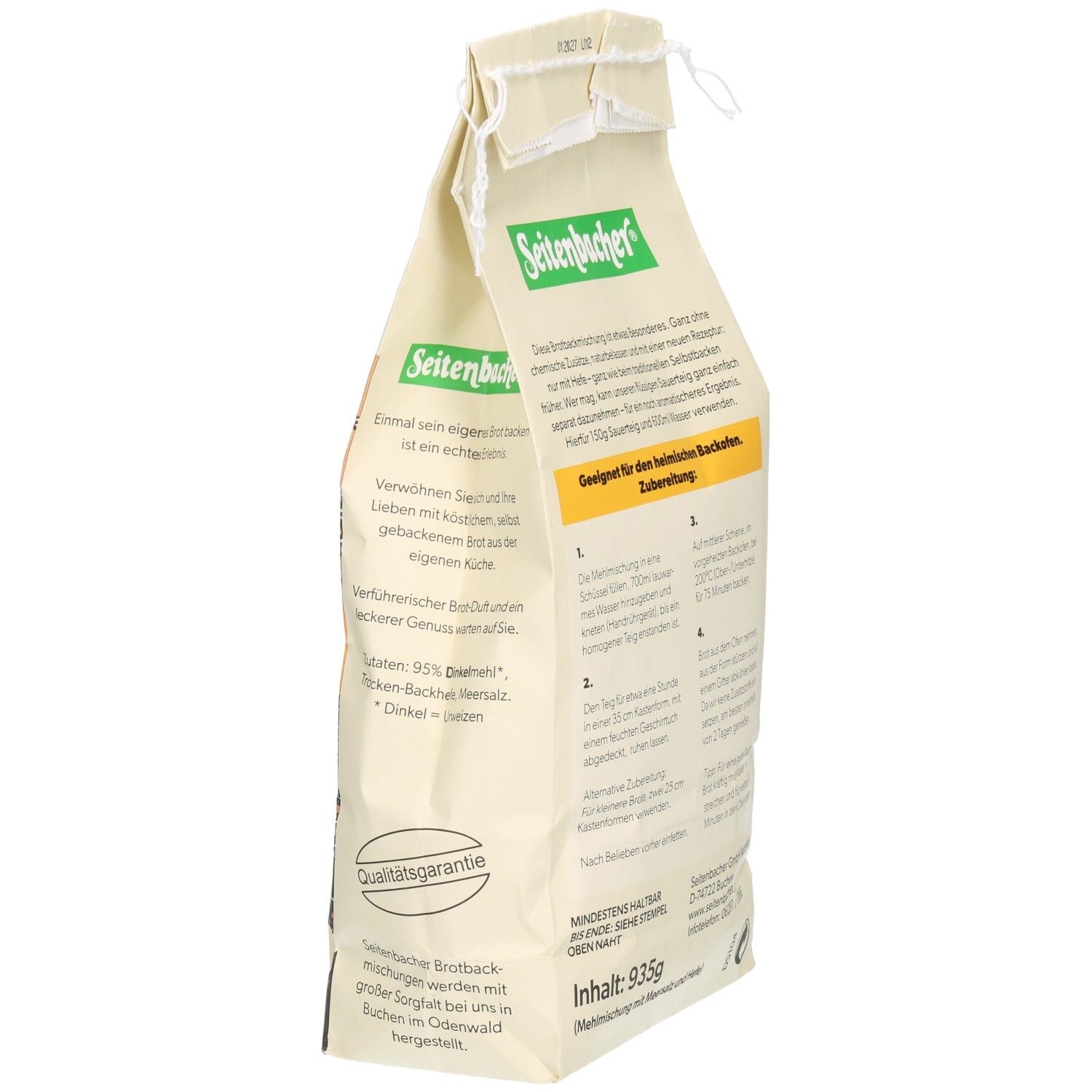 Seitenbacher Dinkelbrot Beutel, schräg. Logo, Produktname, Text. Text: Brotbackmischung mit Meersalz & Back-Hefe. Qualitätsgarantie.