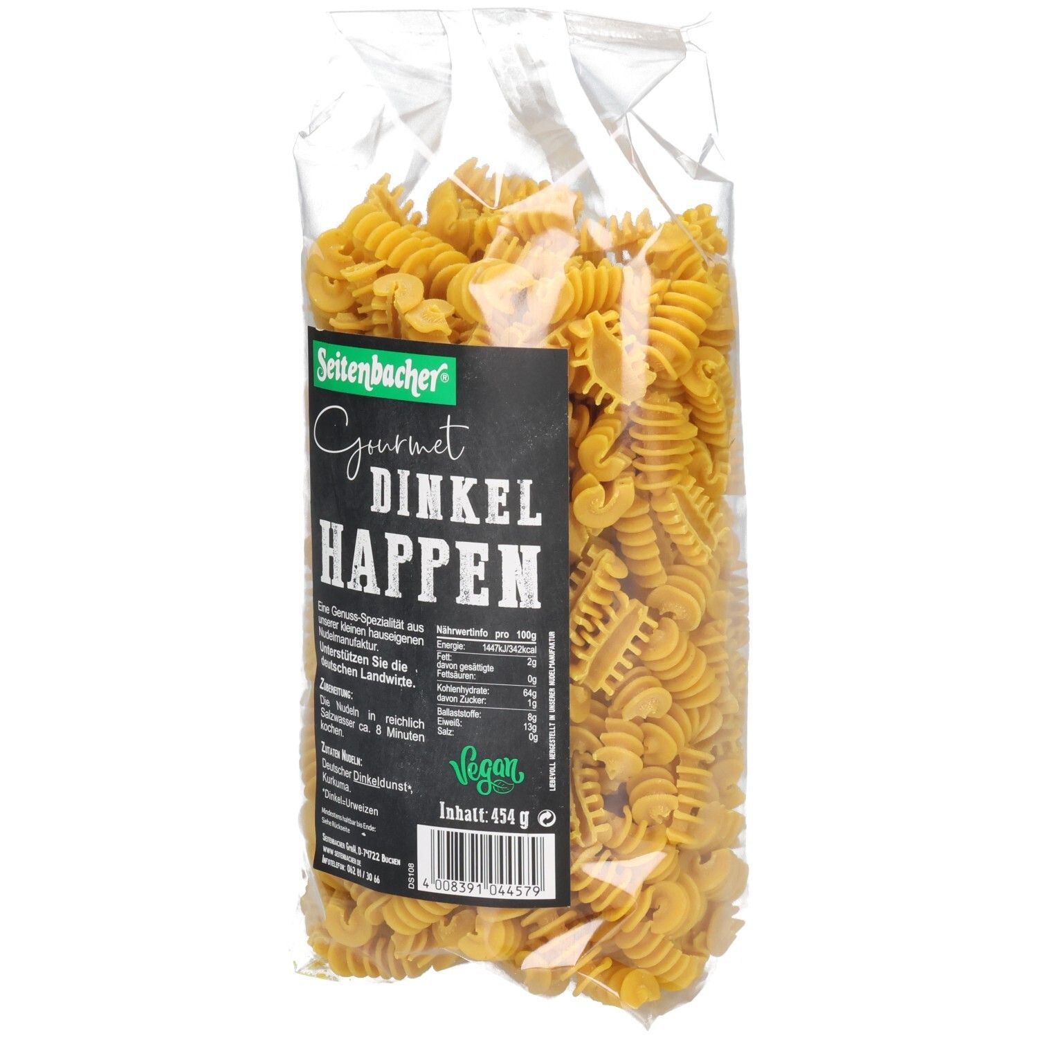Klarsichtbeutel mit gelben Nudeln. Schwarzes Etikett: Seitenbacher Gourmet Dinkel Happen, vegan. Inhalt 454g.