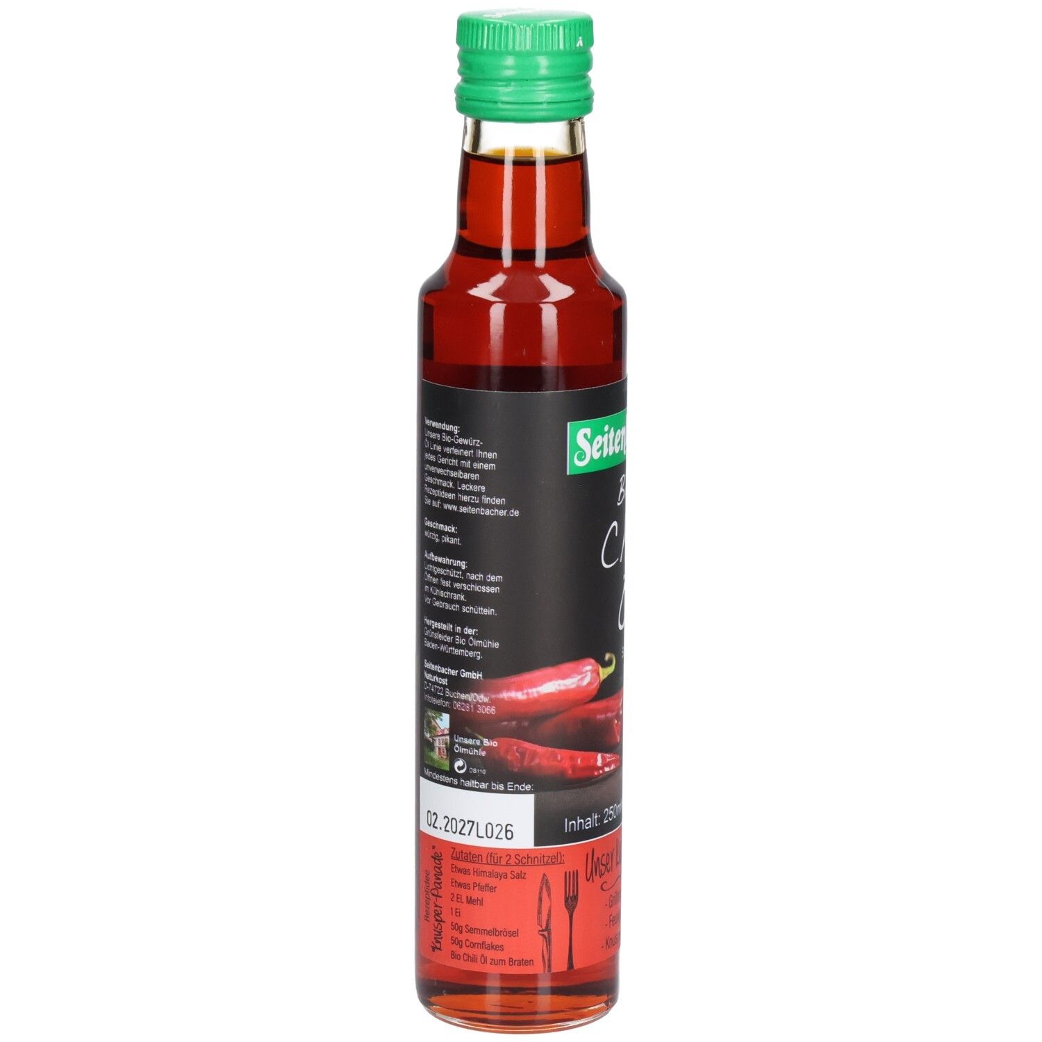 Glasflasche mit grünem Deckel. Etikett mit Produktinformationen und Chili-Abbildung. Enthält Bio Chili Öl.