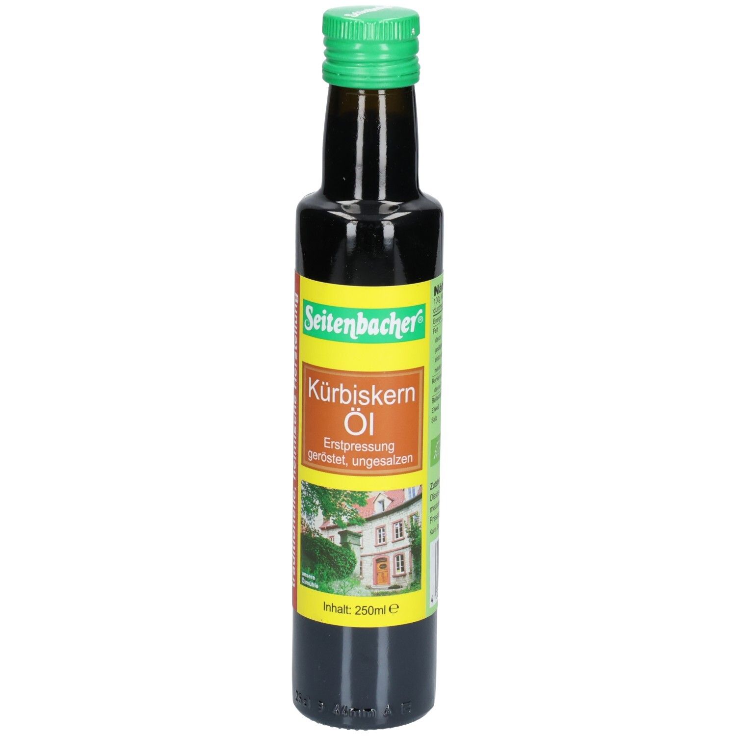 Braune Glasflasche mit grünem Deckel. Etikett mit Produktname und Bild eines Hauses. Seitenbacher Kürbiskern Öl.
