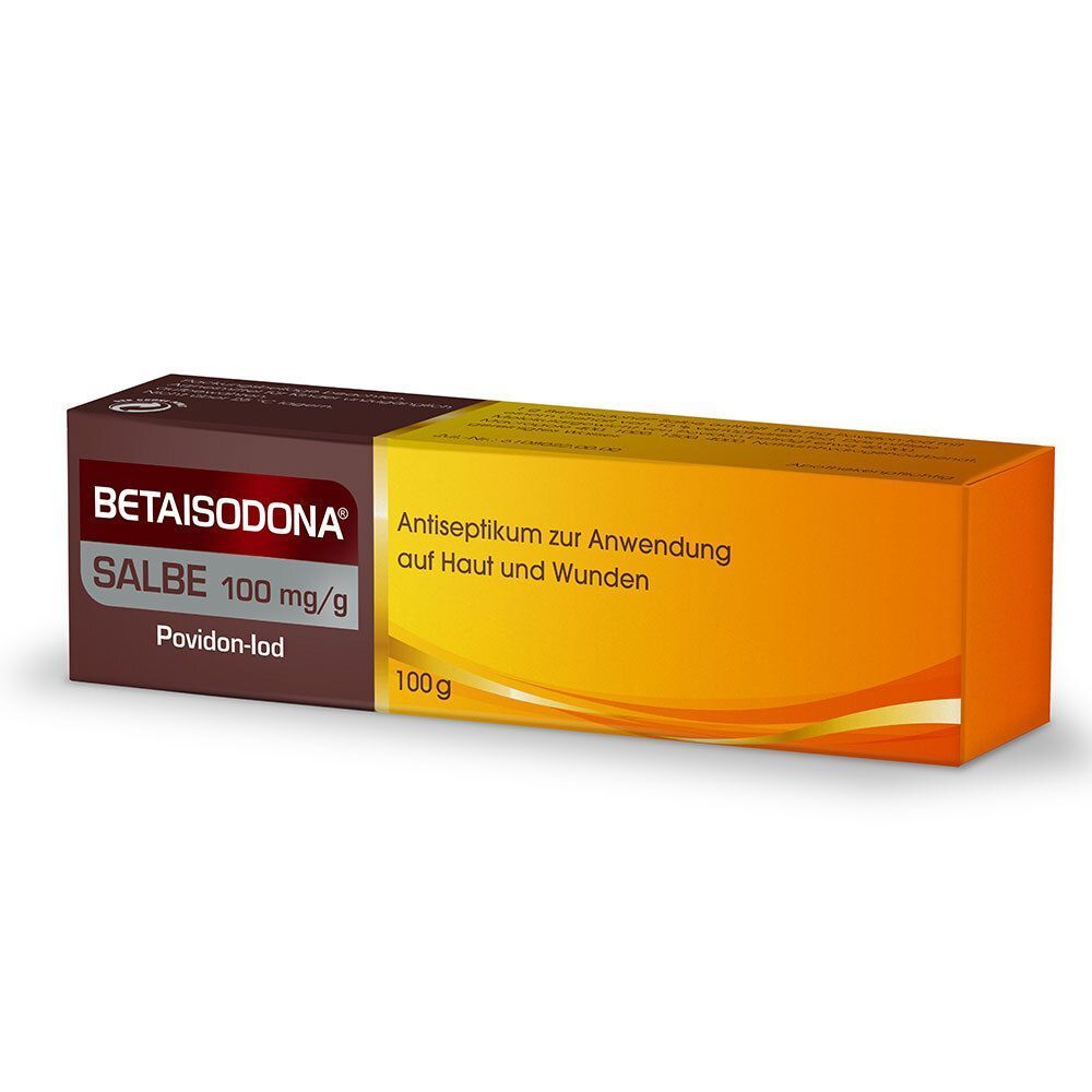 Produktverpackung. Braune Schachtel mit orangefarbenem Teil. Produktname und Text sichtbar.