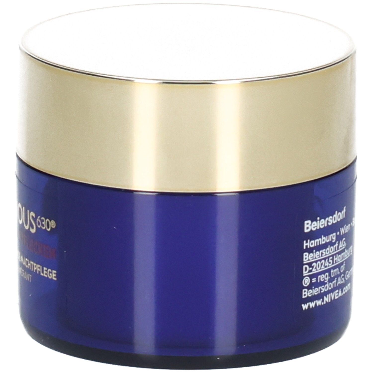 Blaue Creme-Dose mit goldenem Deckel. Rückseite mit Herstellerinformationen.