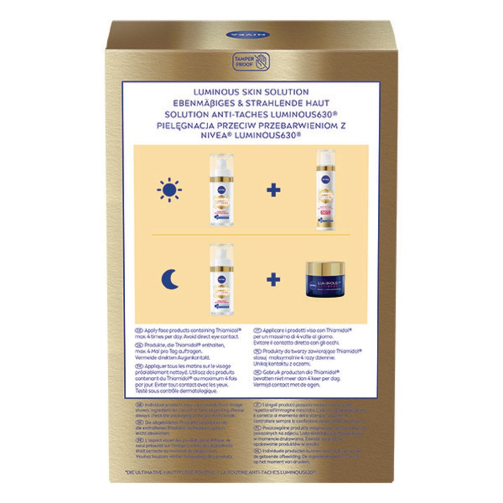 Rückseite der Geschenkbox. Enthält Informationen zur Anwendung und Inhaltsstoffe. Text in Deutsch, Italienisch, Niederländisch und Französisch.