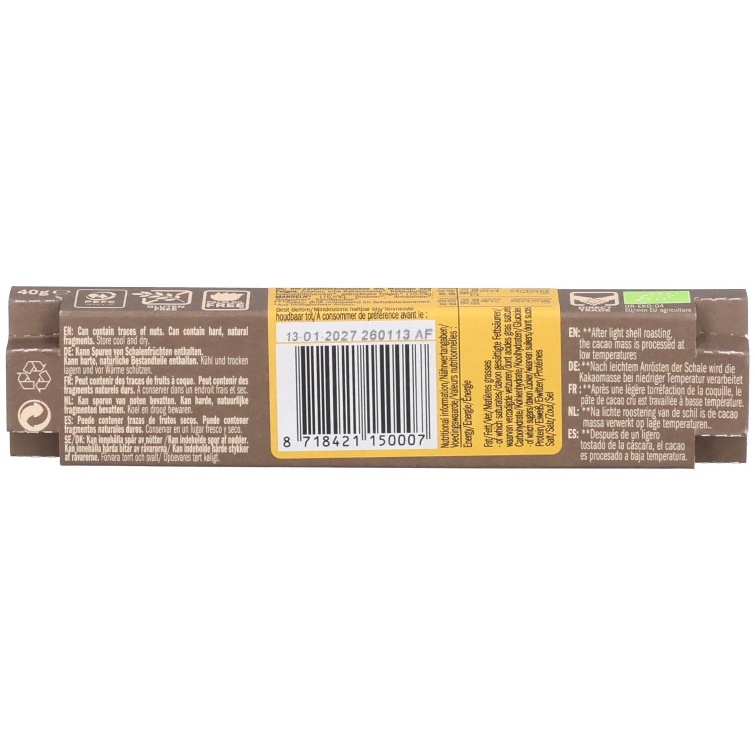 Rückseite der Schokoriegelverpackung. Barcode, Text in mehreren Sprachen. Braune Verpackung. Vegan-Siegel.