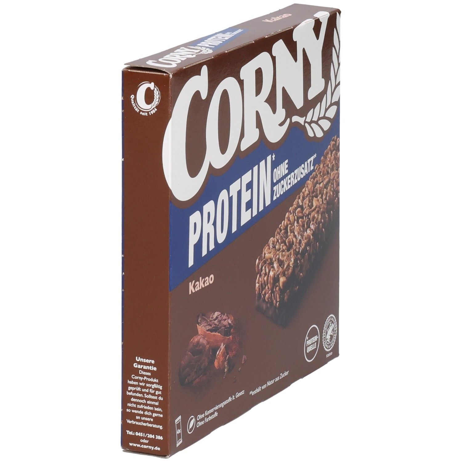Braune Schachtel mit Corny Protein Kakao. Aufdruck: Corny, Protein, ohne Zuckerzusatz. Seitenansicht mit Riegelabbildung.