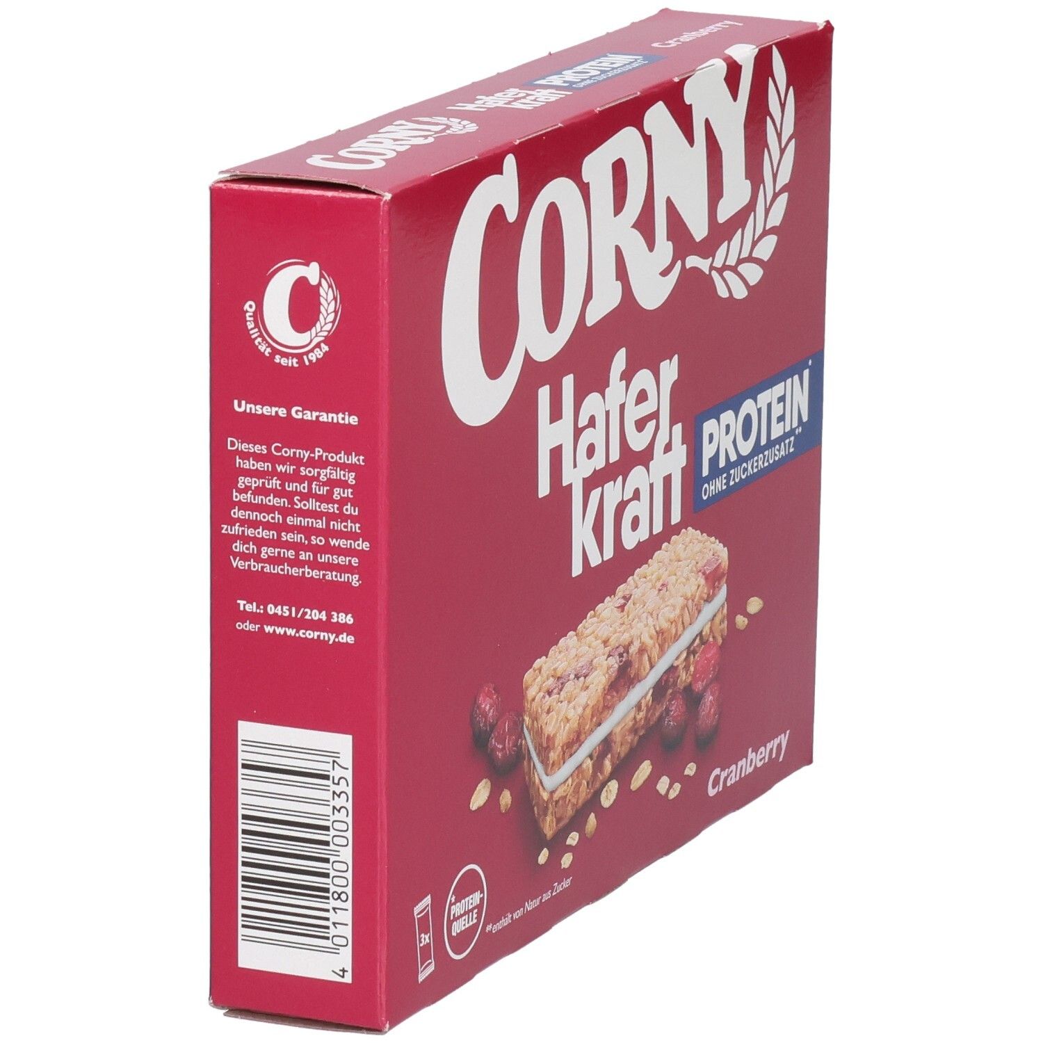 Rote Schachtel Corny Haferkraft Protein Cranberry. Seitenansicht. Text: Protein, ohne Zuckerzusatz. Logo: Corny. Cranberries und Riegel.