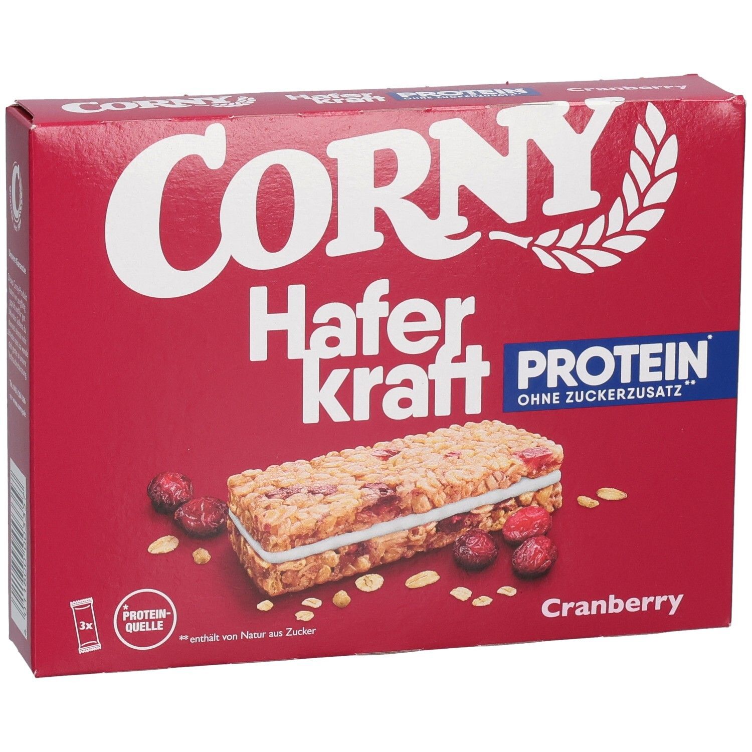 Rote Schachtel Corny Haferkraft Protein Cranberry. Abgebildet: Riegel, Cranberries und Haferflocken. Text: Protein, ohne Zuckerzusatz.