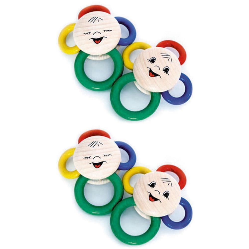 Zwei Babyspielzeuge. Holzgesicht mit roter Mütze, gelben, blauen, roten und grünen Ringen.
