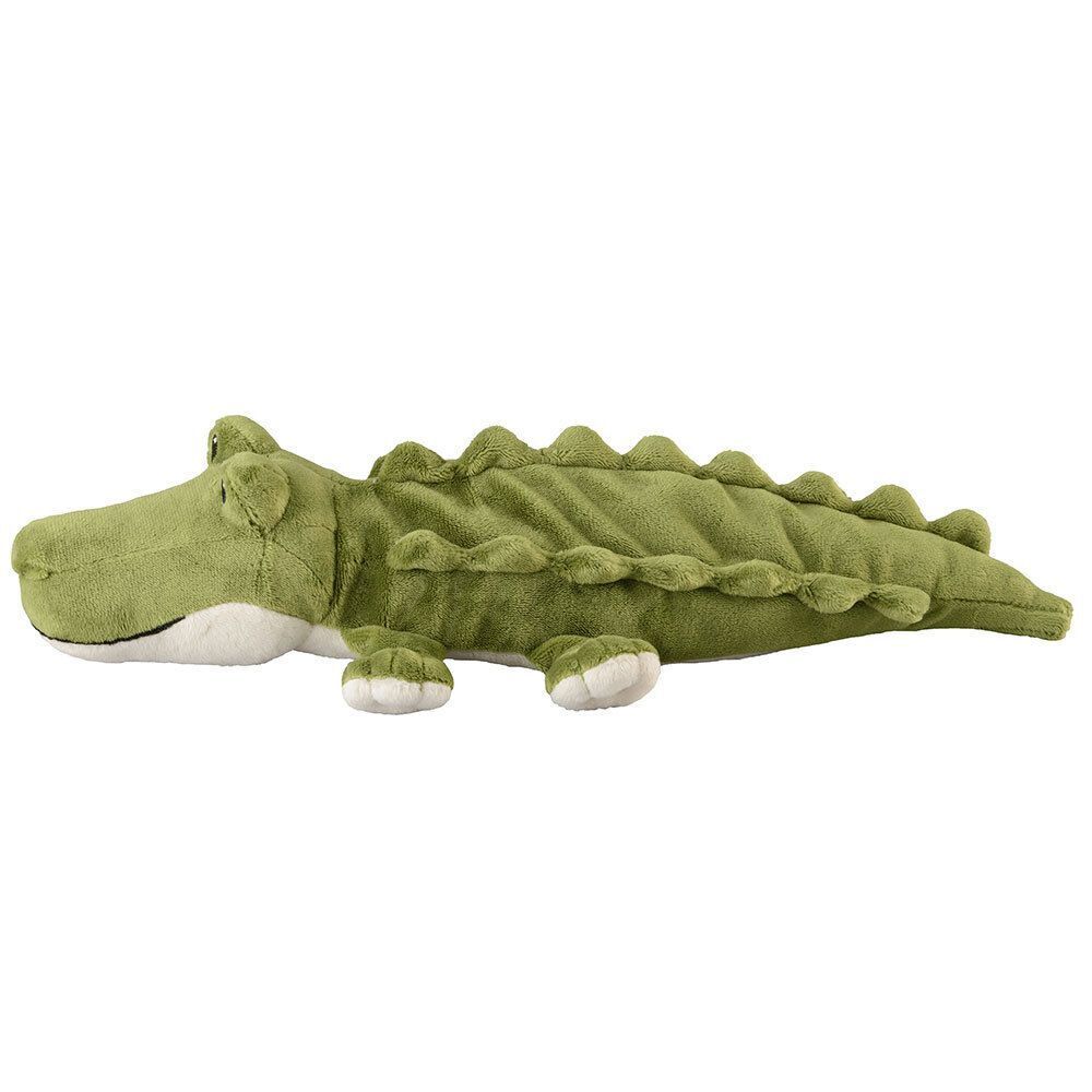Grünes Krokodil-Plüschtier. Flauschiges Material, helle Bauchpartie, schwarze Augen. Liegend.
