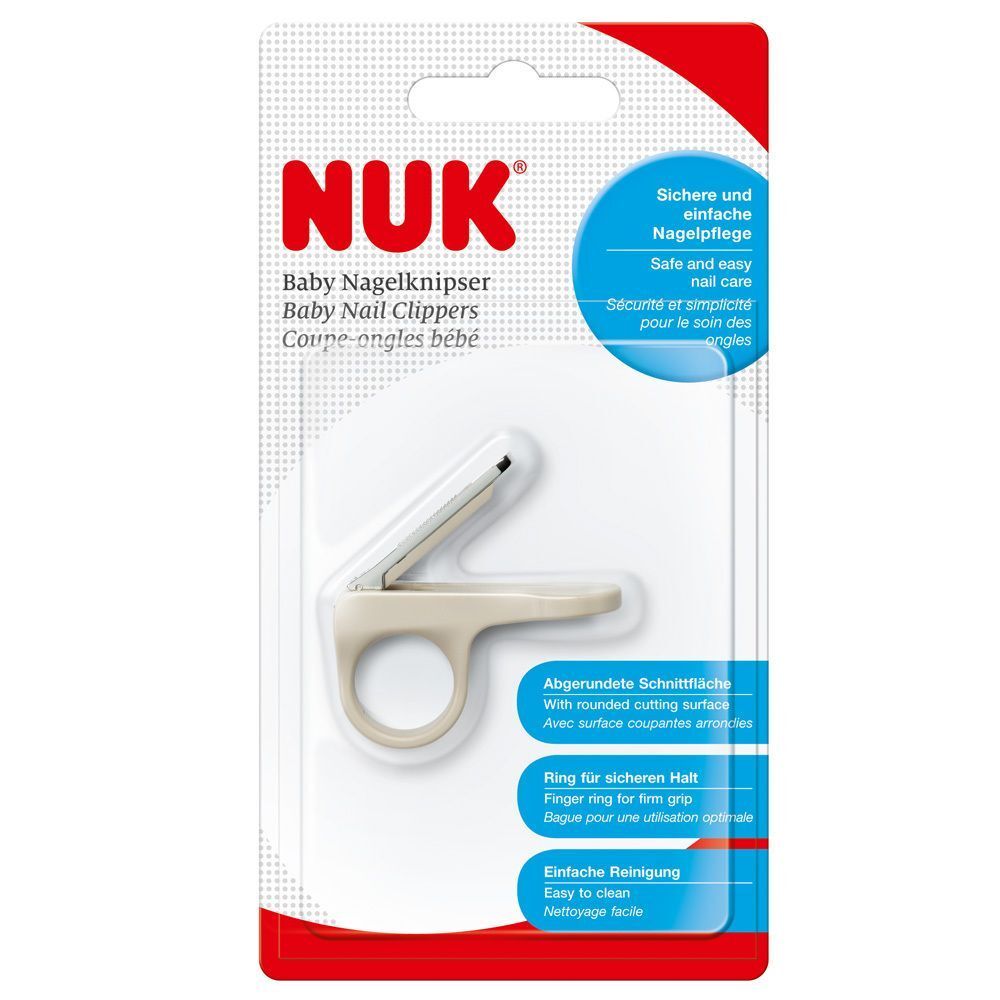 Verpackung mit einem Baby-Nagelknipser. Marke NUK. Text: Baby Nagelknipser, sichere Nagelpflege.