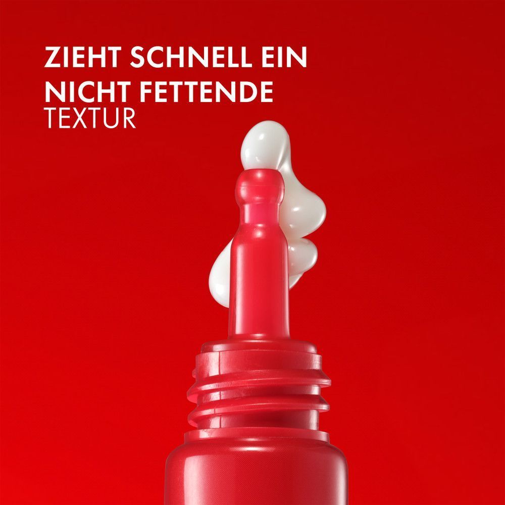 Rote Tube mit Augencreme. Aus der Öffnung kommt weiße Creme. Text: "ZIEHT SCHNELL EIN NICHT FETTENDE TEXTUR".