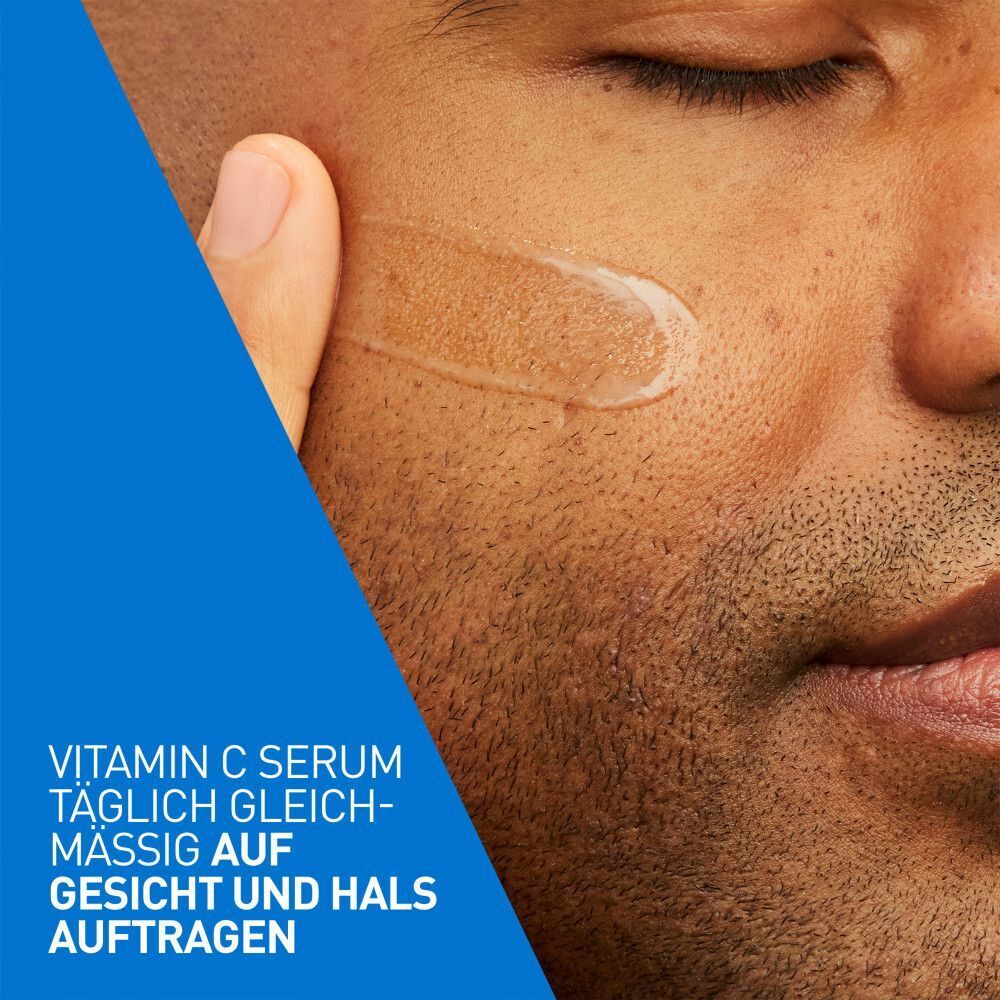 Gesicht eines Mannes mit Serum. Text: Vitamin C Serum täglich gleichmäßig auf Gesicht und Hals auftragen.