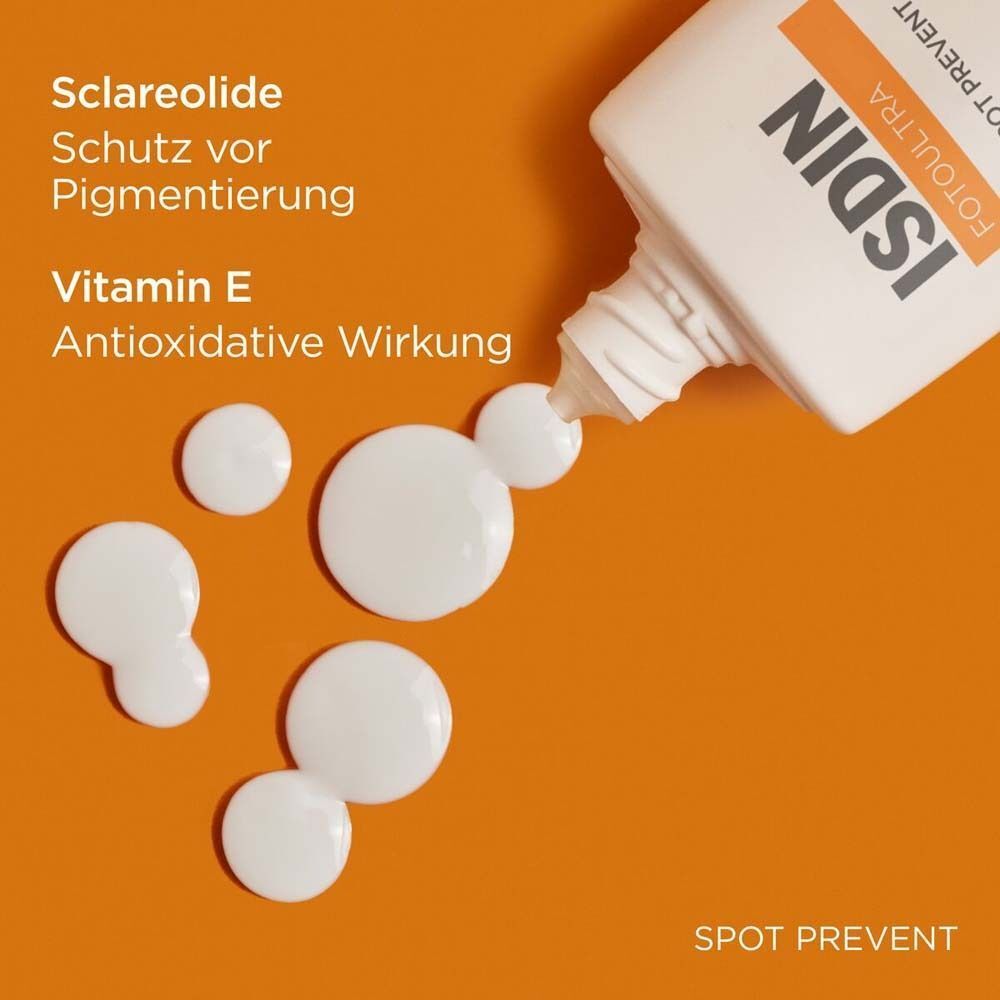 Produkt und Tropfen auf orangefarbenem Hintergrund. Text: Sclareolide, Schutz vor Pigmentierung, Vitamin E.