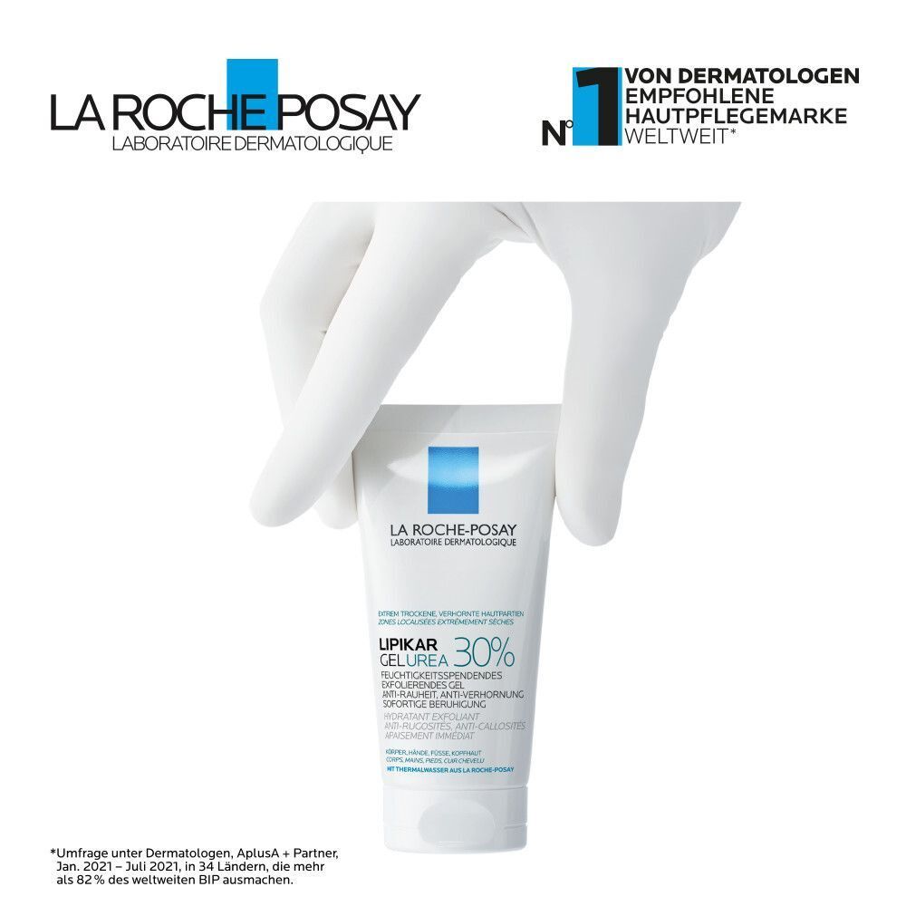 Hand in Handschuhen hält La Roche-Posay Lipikar Gel Urea 30% Tube. Logo und Text. Von Dermatologen empfohlen.