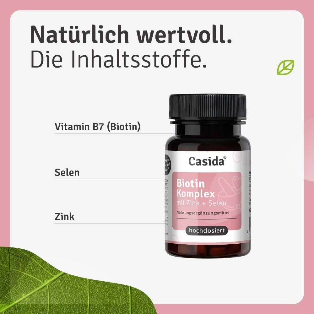 Eine Flasche Casida Biotin Komplex. Braune Flasche mit schwarzem Deckel und rosa Etikett. Inhaltsstoffe: Vitamin B7, Selen, Zink.