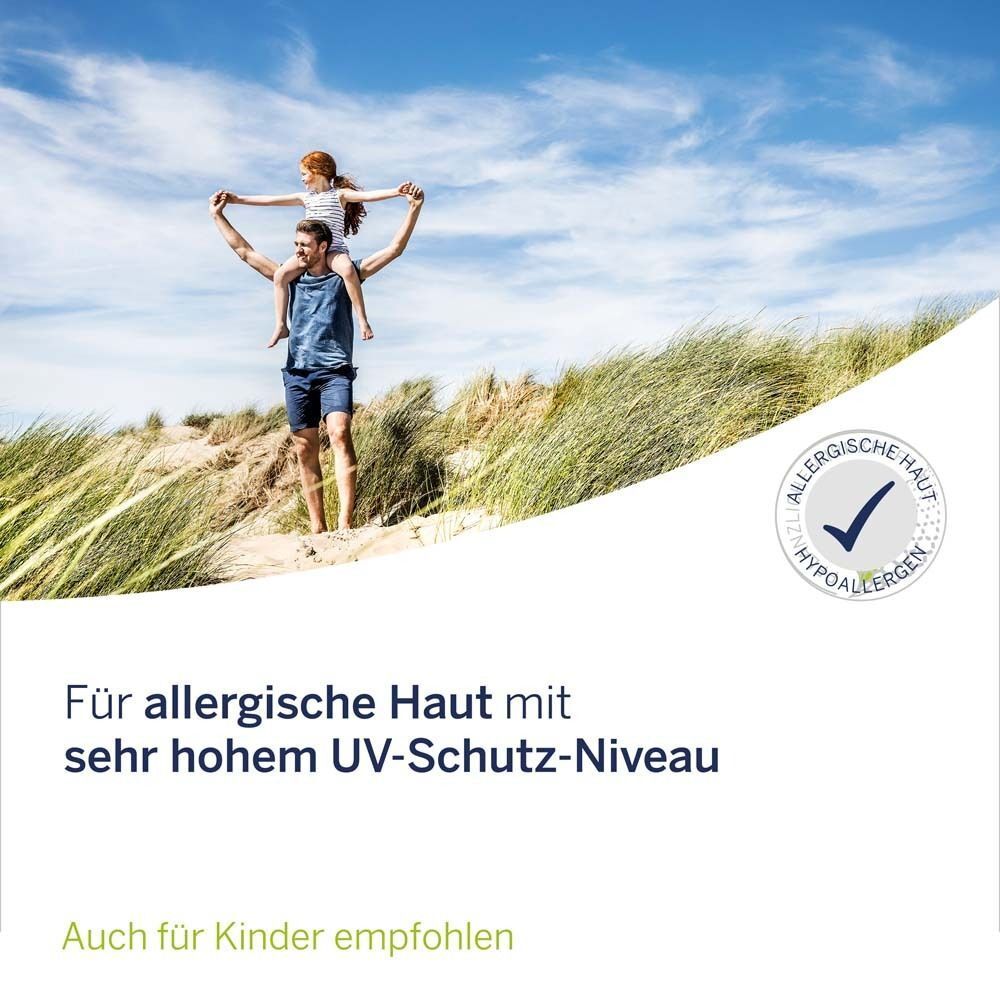 Personen am Strand. Text: Für allergische Haut mit sehr hohem UV-Schutz-Niveau. Auch für Kinder empfohlen. Logo: Allergische Haut, hypoallergen.