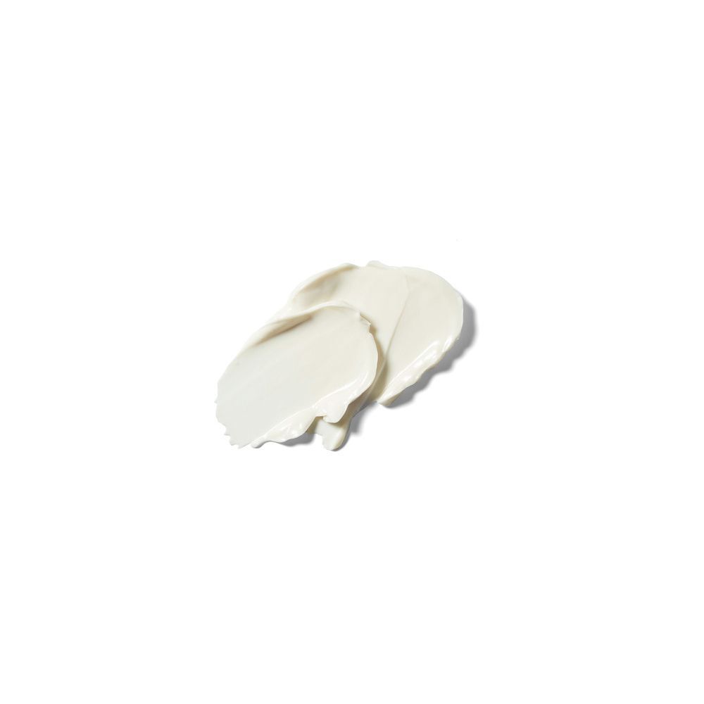 Zwei Kleckse Creme auf weißem Hintergrund.