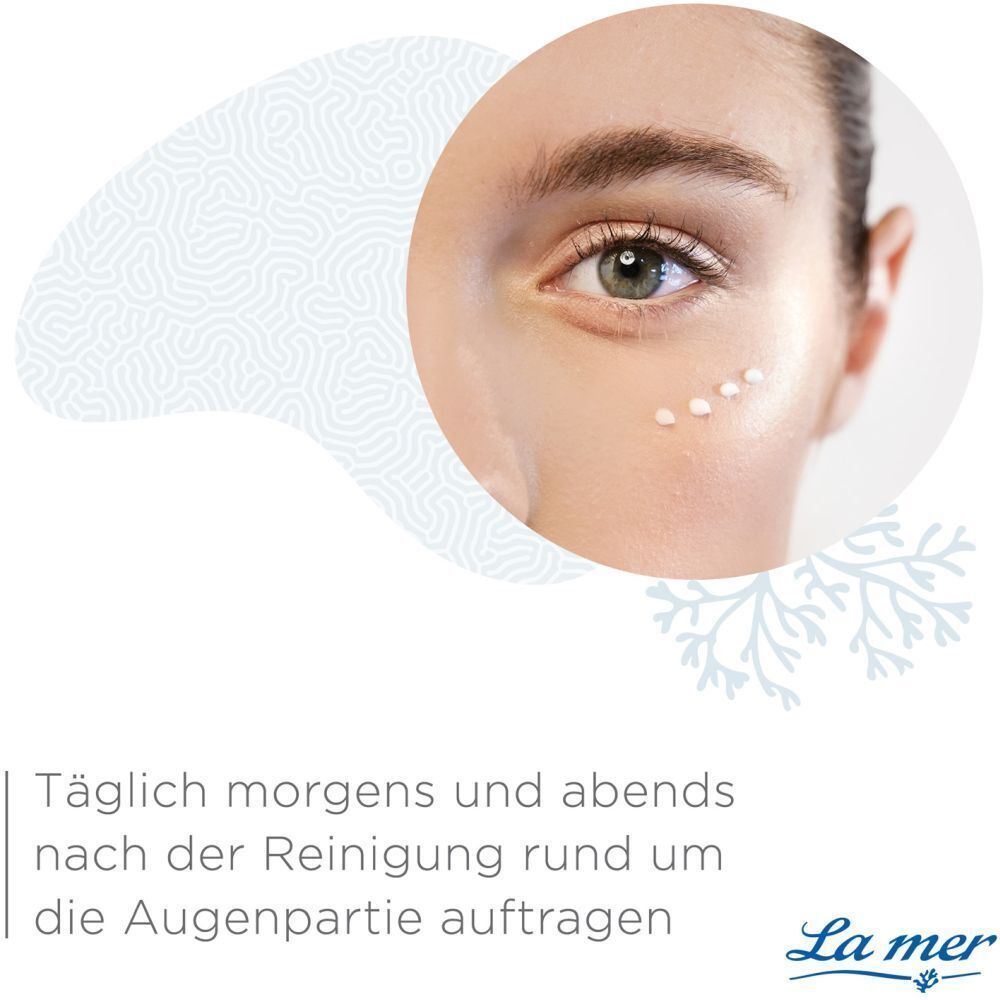 Nahaufnahme eines Auges mit Creme-Punkten. Text: Täglich morgens und abends nach der Reinigung rund um die Augenpartie auftragen. La mer Logo.