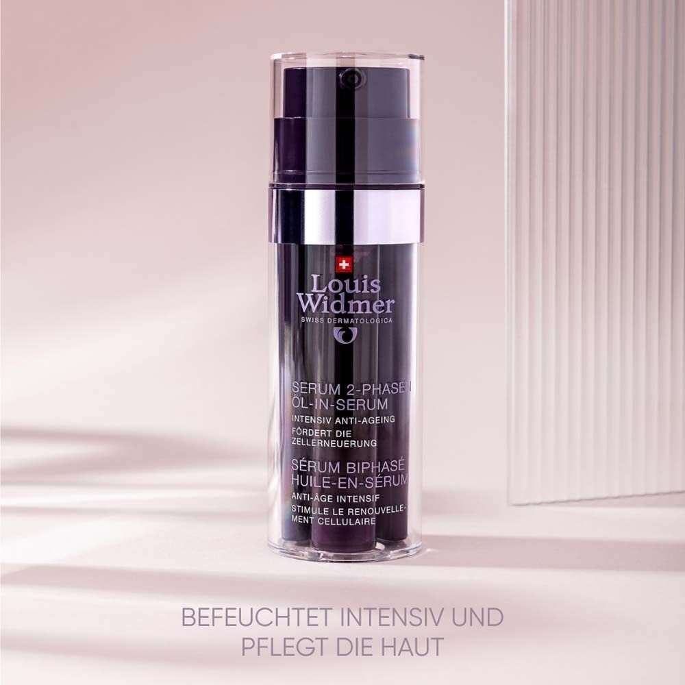 Serum 2-Phasen o.P. von Louis Widmer. Lila Flasche mit silbernen Akzenten. Text: Befeuchtet intensiv und pflegt die Haut.