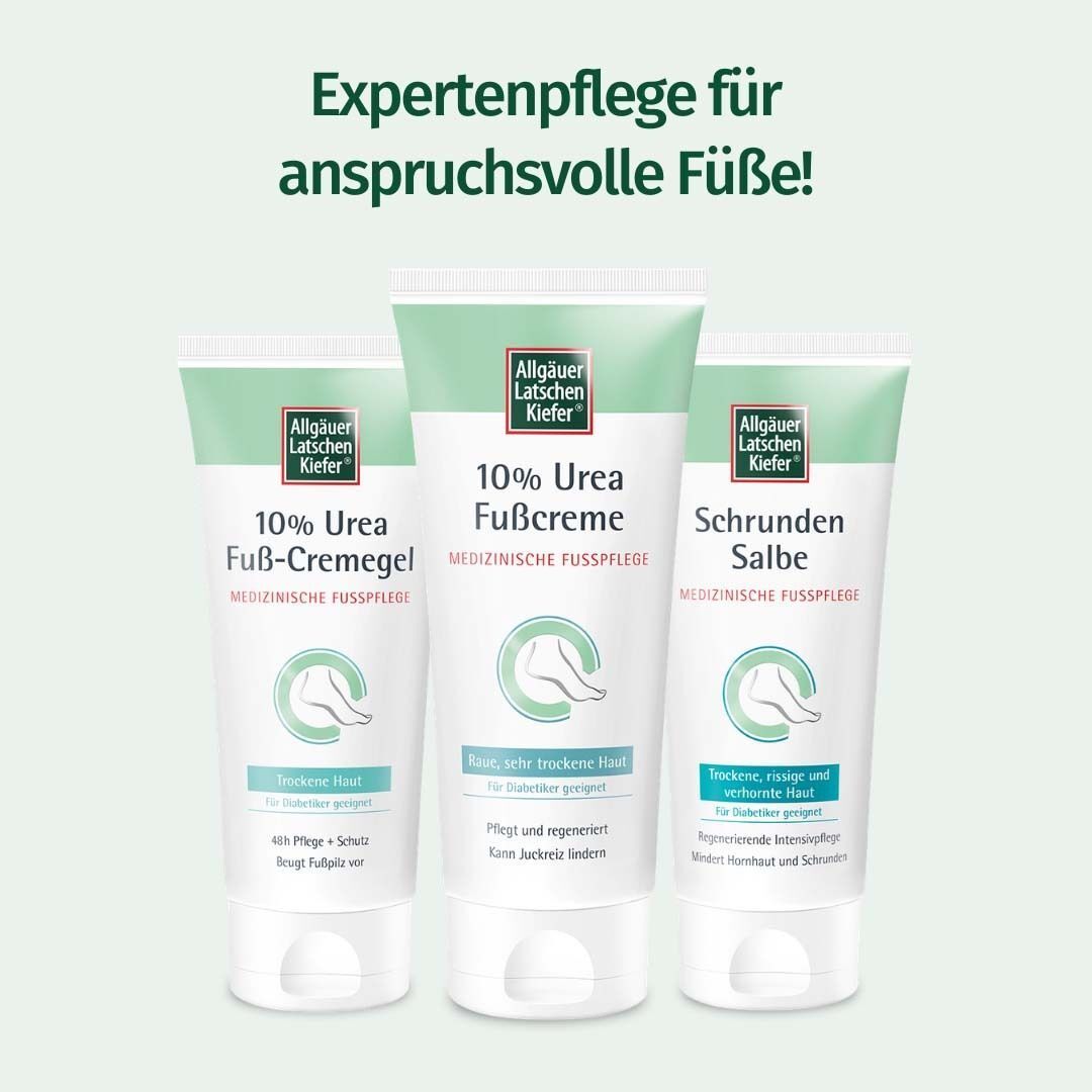 Drei Tuben Fußpflegeprodukte. Aufschrift: 10% Urea Fußcreme, Fuß-Creme-Gel, Schrunden Salbe. Medizinische Fußpflege. Für anspruchsvolle Füße.