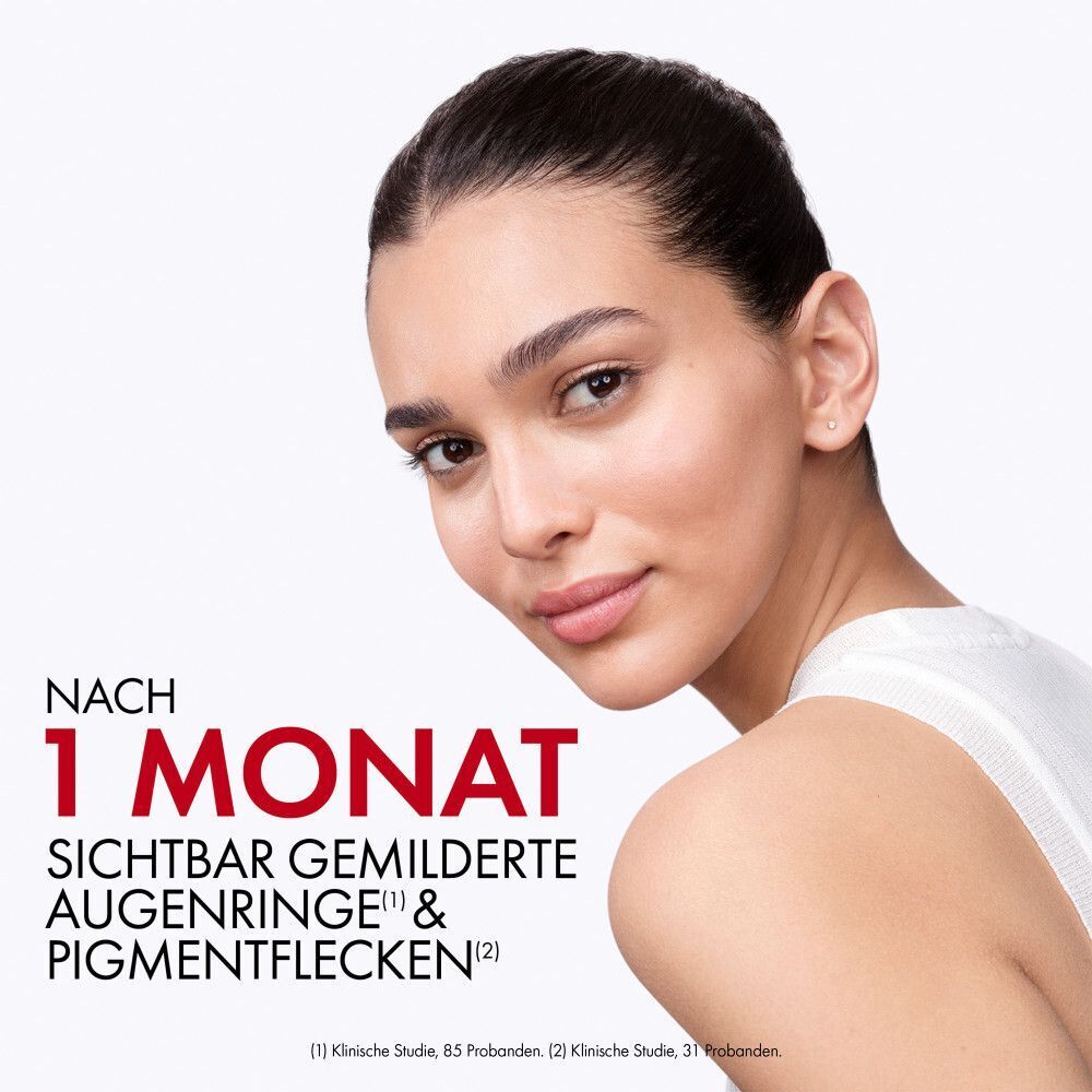 Frau. Text: Nach 1 Monat sichtbar gemilderte Augenringe & Pigmentflecken.