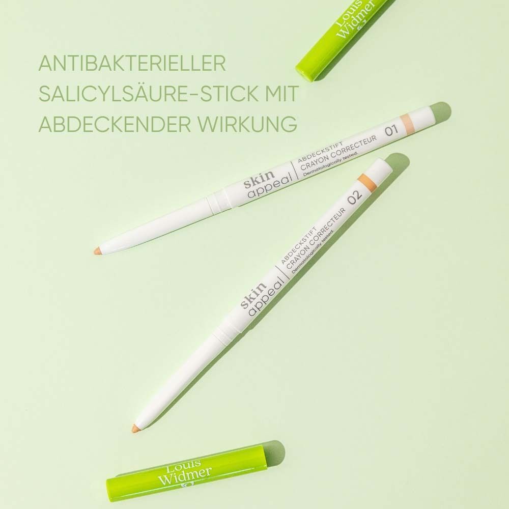 Drei Stifte, weiß mit grün, orangefarbene Spitze. Text: Antibakterieller Salicylsäure-Stick mit abdeckender Wirkung.