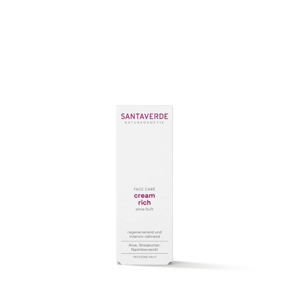 Weiße Verpackung mit lila Schrift. Aufschrift: SANTAVERDE, FACE CARE, cream rich ohne Duft. Für trockene Haut.