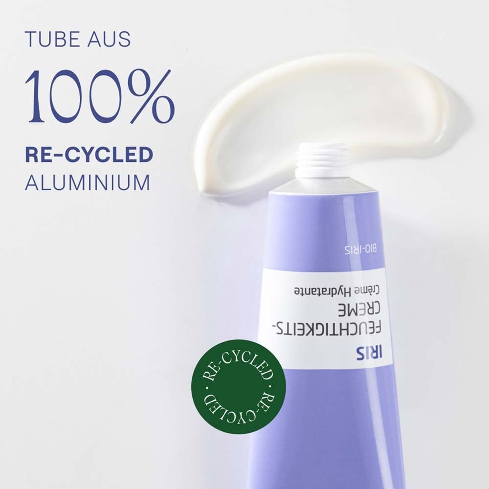 Weleda Iris Feuchtigkeitscreme Tube und Creme. Tube aus 100% recyceltem Aluminium. Grünes Siegel: Re-cycled.