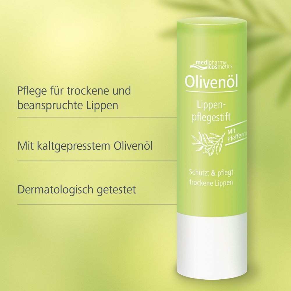 Lippenpflegestift, grün-weiß, mit Text und Logo. Aufschrift: Olivenöl Lippenpflegestift. Mit Pfefferminze. Schützt & pflegt trockene Lippen.