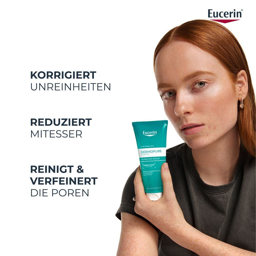 Frau hält Eucerin DermoPure Clinical Waschpeeling. Text: Korrigiert Unreinheiten, reduziert Mitesser, reinigt & verfeinert die Poren.