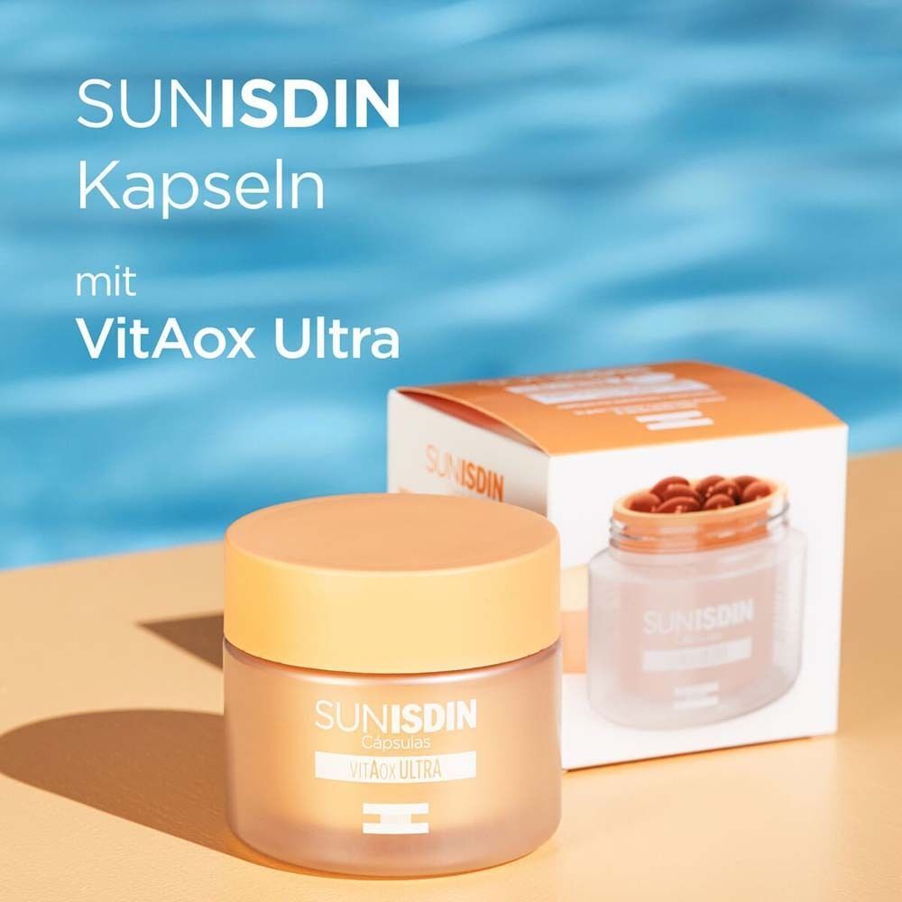 SunISDIN Kapseln Dose und Verpackung. Dose mit orangefarbenem Deckel, transparente Dose, Kapseln. Verpackung mit Produktnamen.